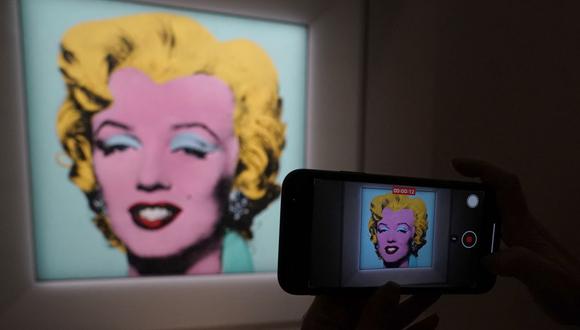 El icónico cuadro, titulado "Shot Sage Blue Marilyn" se convierte así en la segunda obra más cara de la historia vendida en subasta. (Foto: TIMOTHY A. CLARY / AFP)