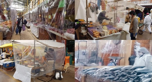 Pasco: Comerciantes de Yanacancha forran sus puestos con plástico para atender y evitar contagios. (Foto: RPP Noticias / Héctor Chaca)