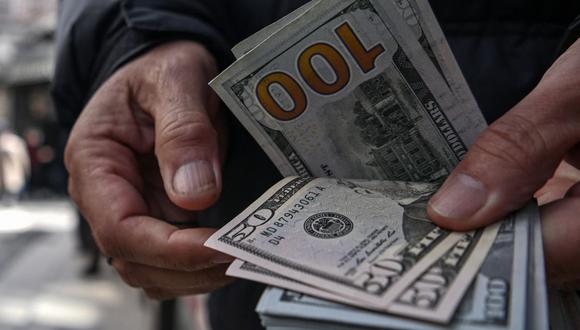 Conoce el precio del dólar en Perú para la jornada del día de hoy, martes 14 de marzo de 2023 | Foto: AFP / Archivo