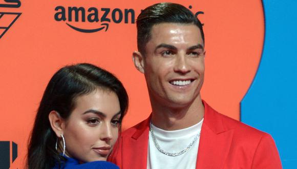 Cristiano Ronaldo y la española Georgina Rodríguez, a quien conoció cuando jugaba en Real Madrid (Foto: AFP)