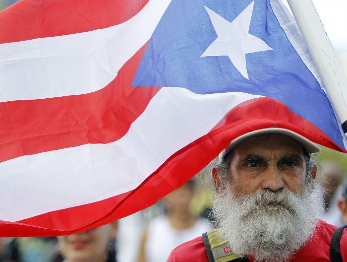 Muchos protestaron en las calles de San Juan. (AFP)