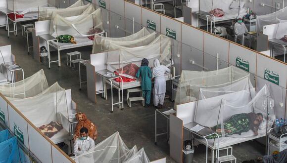 En total, se han registrado más de 246 millones de contagios desde que inició la pandemia a comienzos de 2020. (Foto:  Arif ALI / AFP)