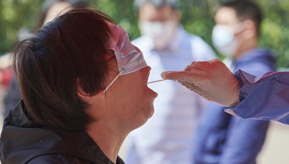 Desde el comienzo de la pandemia, Shanghái ha registrado un total de 42.379 casos sintomáticos de COVID-19 y 55 fallecimientos. (Foto:  LIU JIN / AFP)
