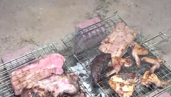 Hinchas argentinos prepararon asado en Qatar. (Foto: Captura de video)
