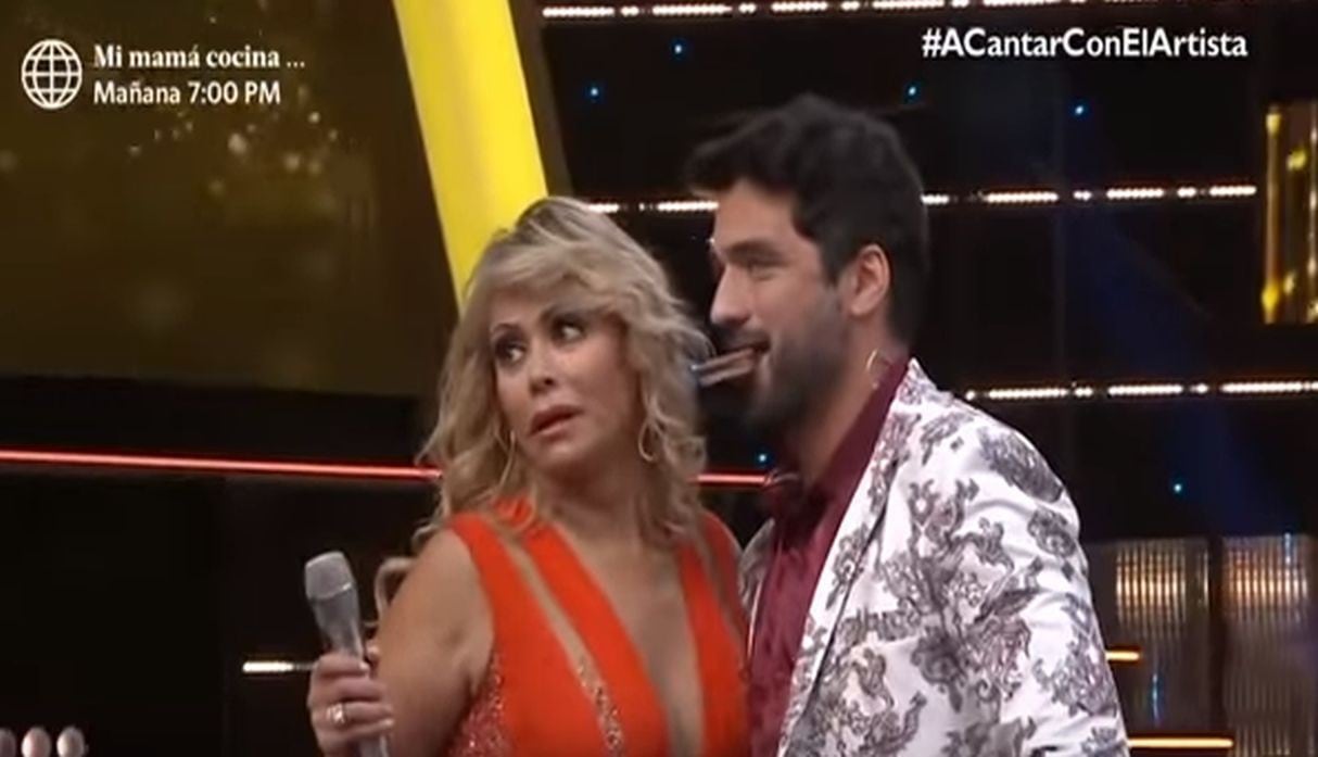 Pablo Heredia y Gisela Valcárcel en 'El artista del año'. (Capturas: América TV)