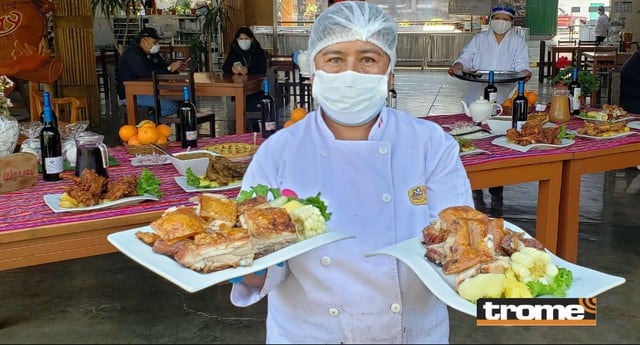 Restaurantes de Huaral celebran el día de su plato estrella: el chancho al palo. Lo sirven con carapulcra, arroz, ensalada criolla. (Isabel Medina - Trome)