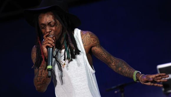 Lil Wayne decidió declararse culpable luego que le encontraran un arma en su equipaje. (Foto: Hector Retamal / AFP)