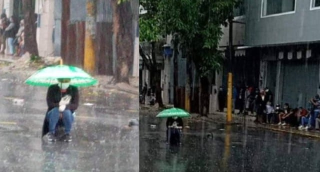 Iquitos: Responsable mujer soportó intensa lluvia y evitó aglomerarse con otras personas por COVID-19. (Foto cortesía: Iquitos al Rojo Vivo)