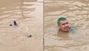 Villa María del Triunfo: Sujeto se zambulle y nada en medio de la inundación del bypass Nueva Esperanza | VIDEO