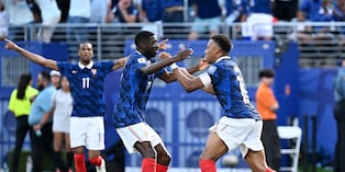 France's forward #10 Kylian Mbappe (R) celebrates scoring his team's first goal with forward #07 Ousmane Dembele during the 2026 World Cup round of 32 football match between France and Sweden at the New York/New Jersey Stadium in East Rutherford on June 30, 2026. (Photo by Jewel SAMAD / AFP)