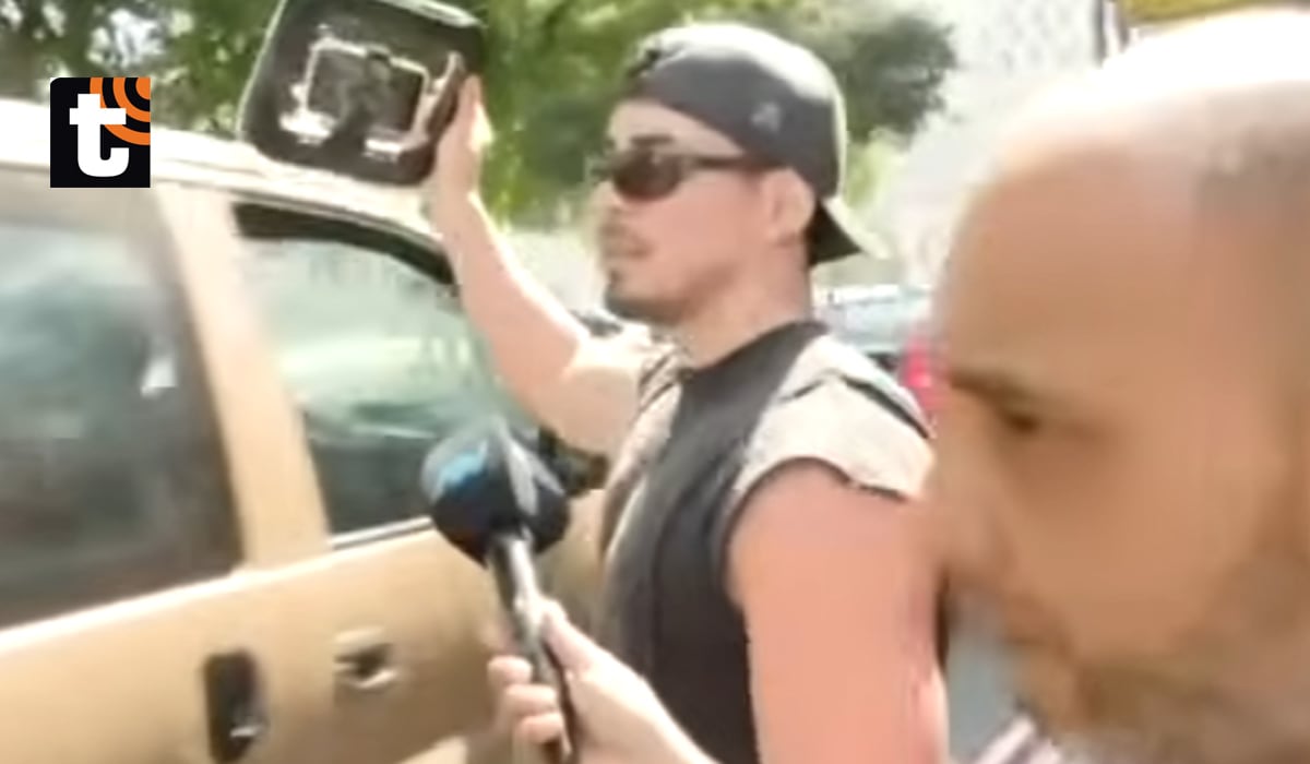 Piero Arenas y el reportero de Magaly Medina.