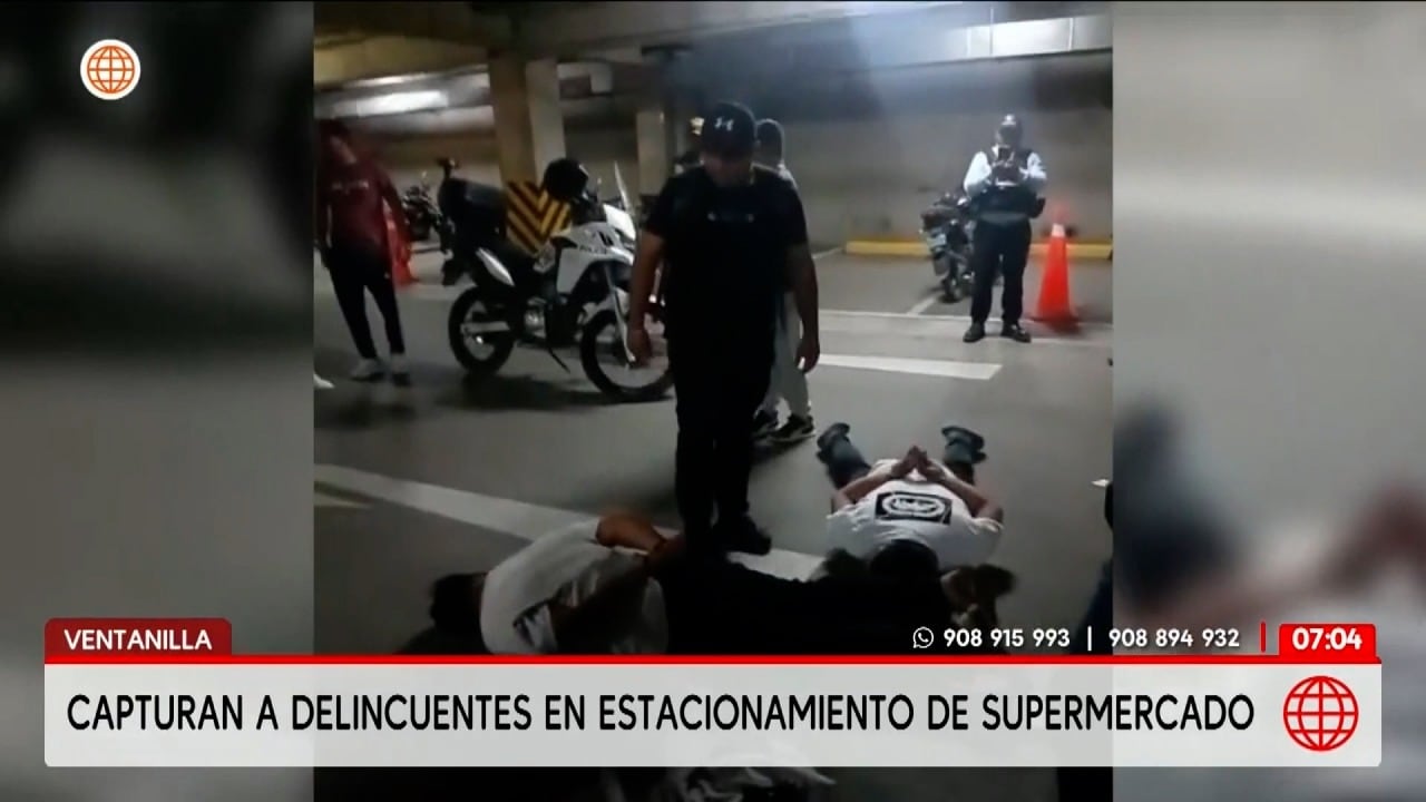 Dos delincuentes fueron detenidos tras una balacera en estacionamiento de Ventanilla. (América TV)