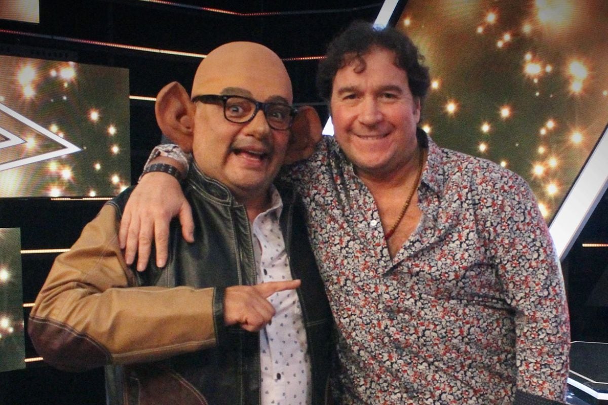 Julio Andrade junto a su amigo de la infancia, el imitador JB.