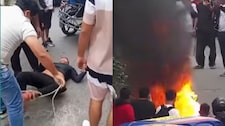 Los Olivos: Amarran y golpean a sujeto por robo a escolar y le queman la moto | VIDEO