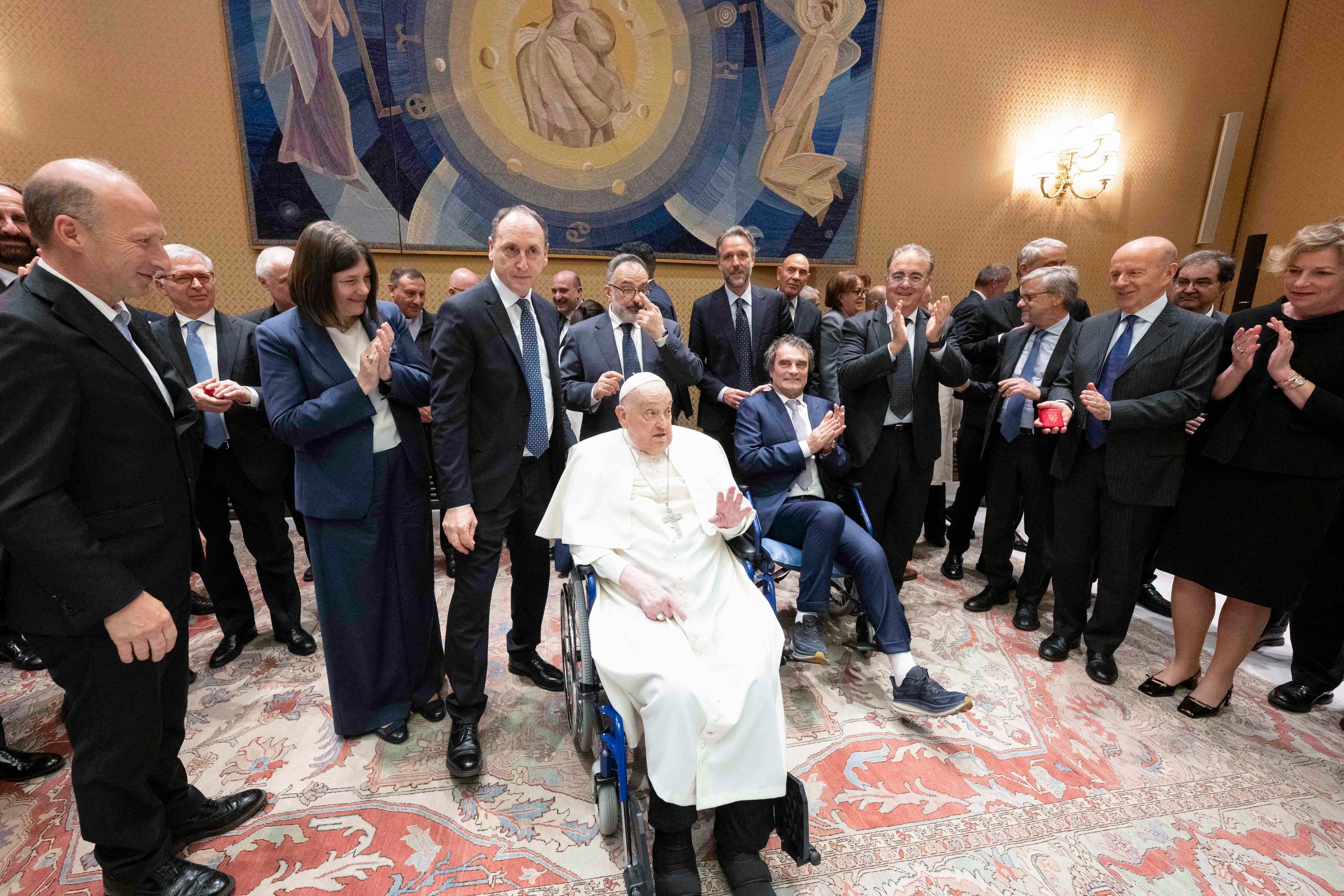 This photo taken and handout on April 16, 2025 by The Vatican Media shows Pope Francis during a meeting with the healthcare personnel of the Vatican and the Gemelli Hospital in The Vatican. (Photo by Handout / VATICAN MEDIA / AFP) / RESTRICTED TO EDITORIAL USE - MANDATORY CREDIT "AFP PHOTO / VATICAN MEDIA" - NO MARKETING - NO ADVERTISING CAMPAIGNS - DISTRIBUTED AS A SERVICE TO CLIENTS