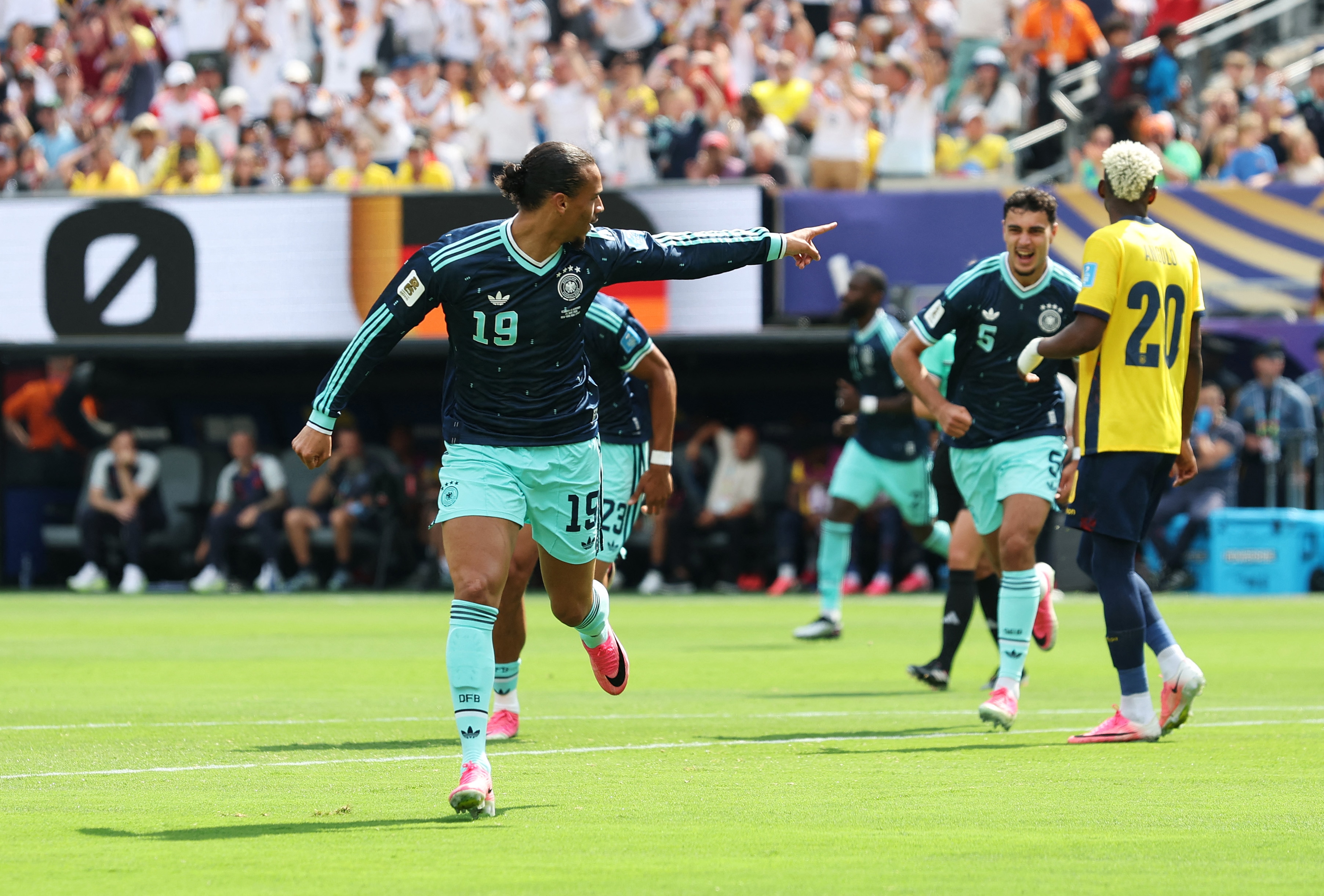 EAST RUTHERFORD, NEW JERSEY - JUNE 25: Leroy Sane #19 of Germany celebrates scoring his team's first goal during the FIFA World Cup 2026 Group E match between Ecuador and Germany at New York New Jersey Stadium on June 25, 2026 in East Rutherford, New Jersey. Alexander Hassenstein/Getty Images/AFP (Photo by ALEXANDER HASSENSTEIN / GETTY IMAGES NORTH AMERICA / Getty Images via AFP)