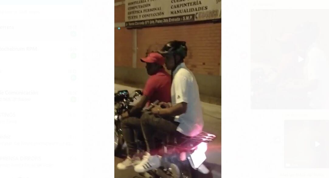 Vecinos están cansados del andar de los delincuentes extranjeros. Aquí, los sujetos inician el paso y uno de ellos saca el arma. | Foto: Reproducción de video