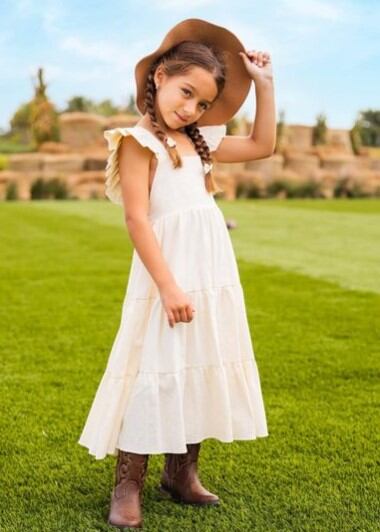 Alaïa luciendo el vestido para su primera comunión (Foto: Alaïa/Instagram)