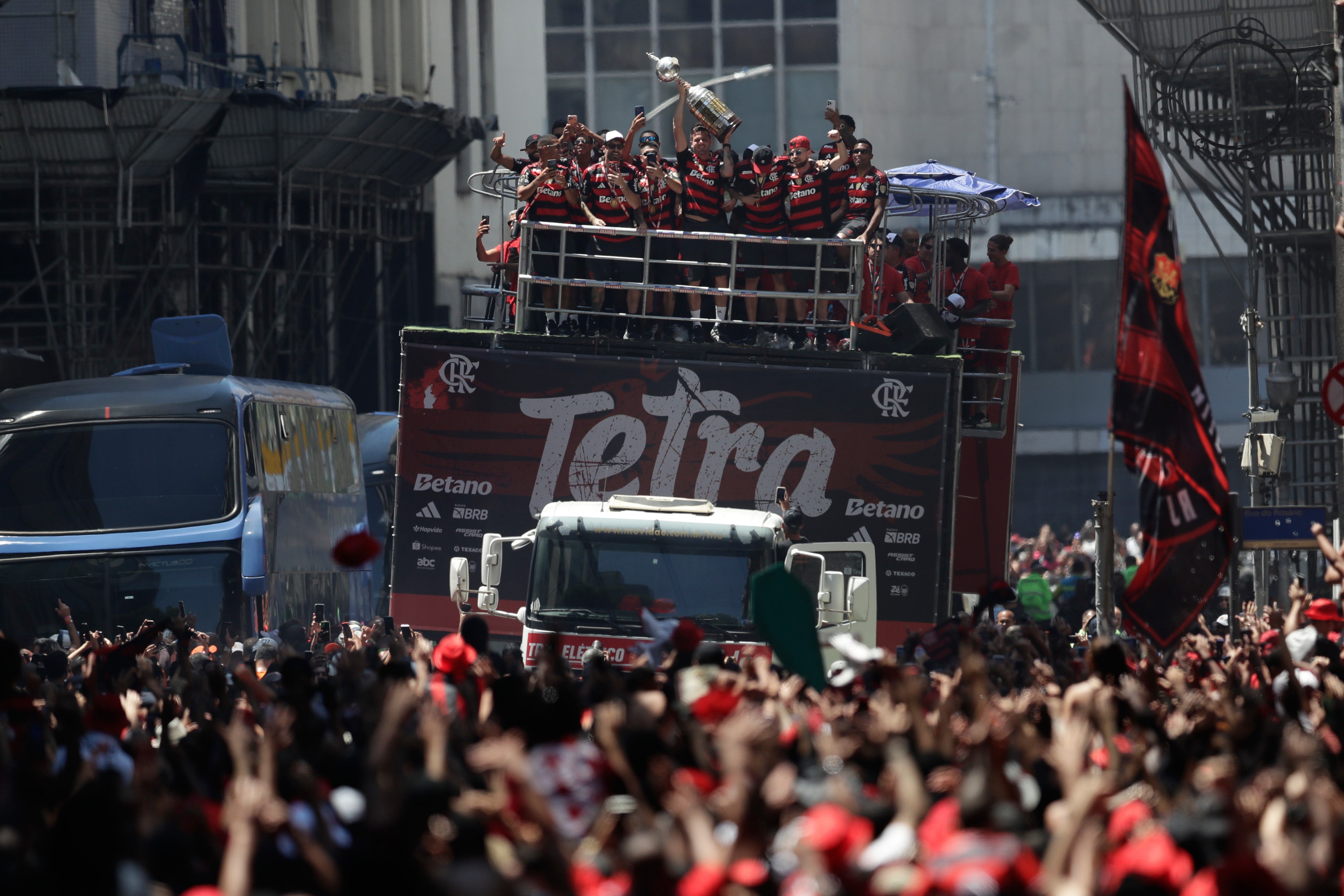 Players of Brazil's Flamengo take part in a homecoming celebration after winning the Copa Libertadores, in Rio de Janeiro, Sunday, Nov. 30, 2025. (AP Photo/Bruna Prado)