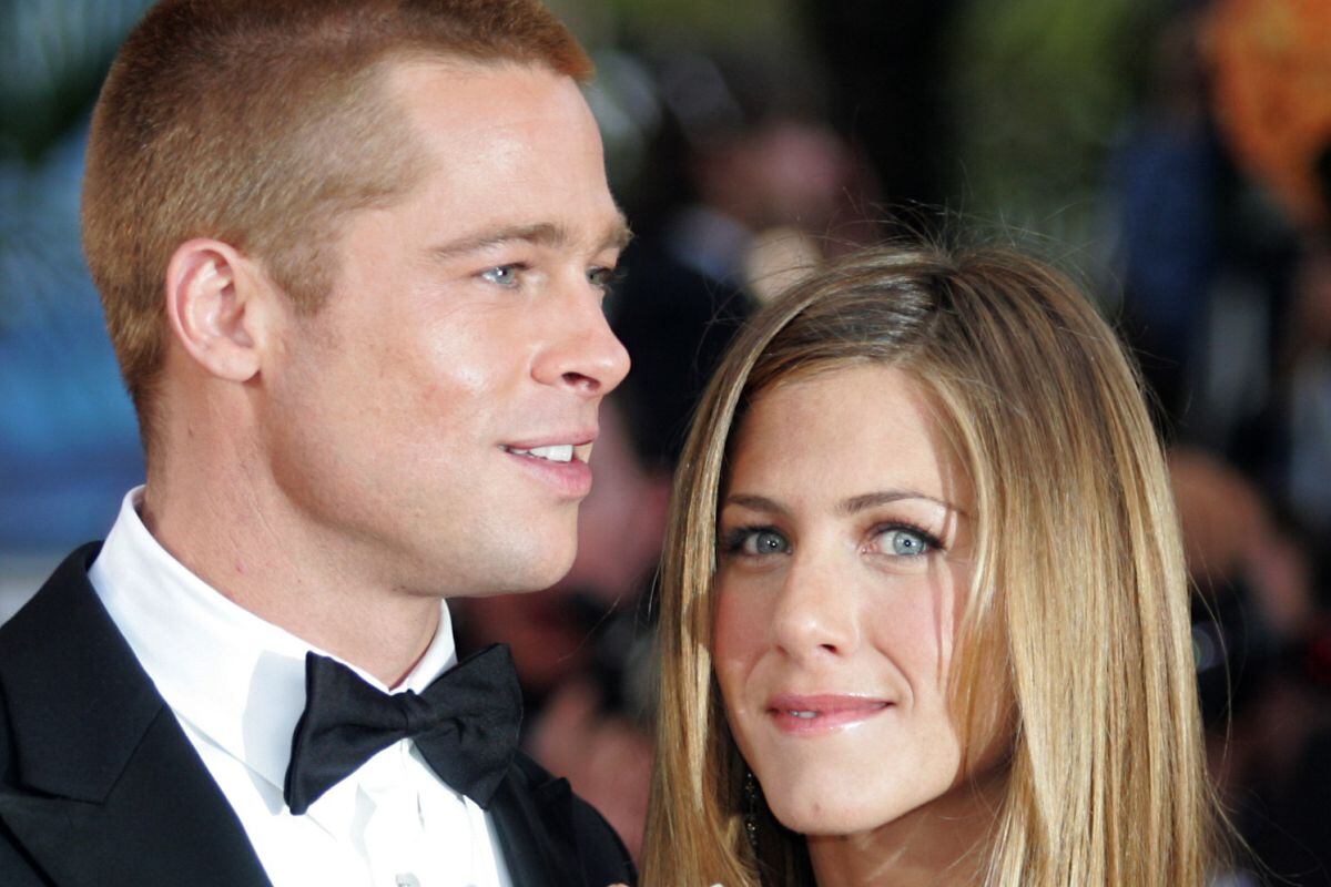 Brad Pitt y Jennifer Aniston mantienen una relación amical de bajo perfil. (Foto: AFP)