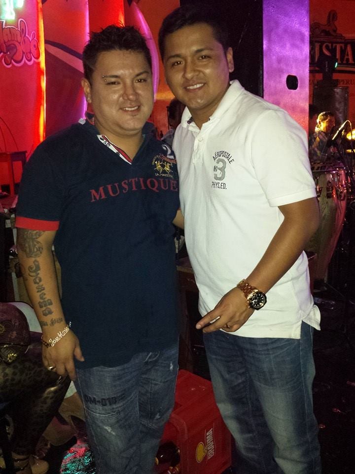 Víctima con su hermano José María Palacios.