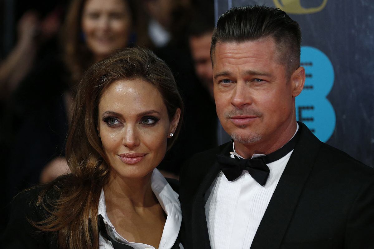 DE aquel gran amor que un día se tuvieron Brad Pitt y Angelina Jolie no queda nada. Aquí cuando ambos estaban en la alfombra roja de los BAFTA British Academy Film Awards en la Royal Opera House de Londres el 16 de febrero de 2014 (Foto: Andrew Cowie / AFP)