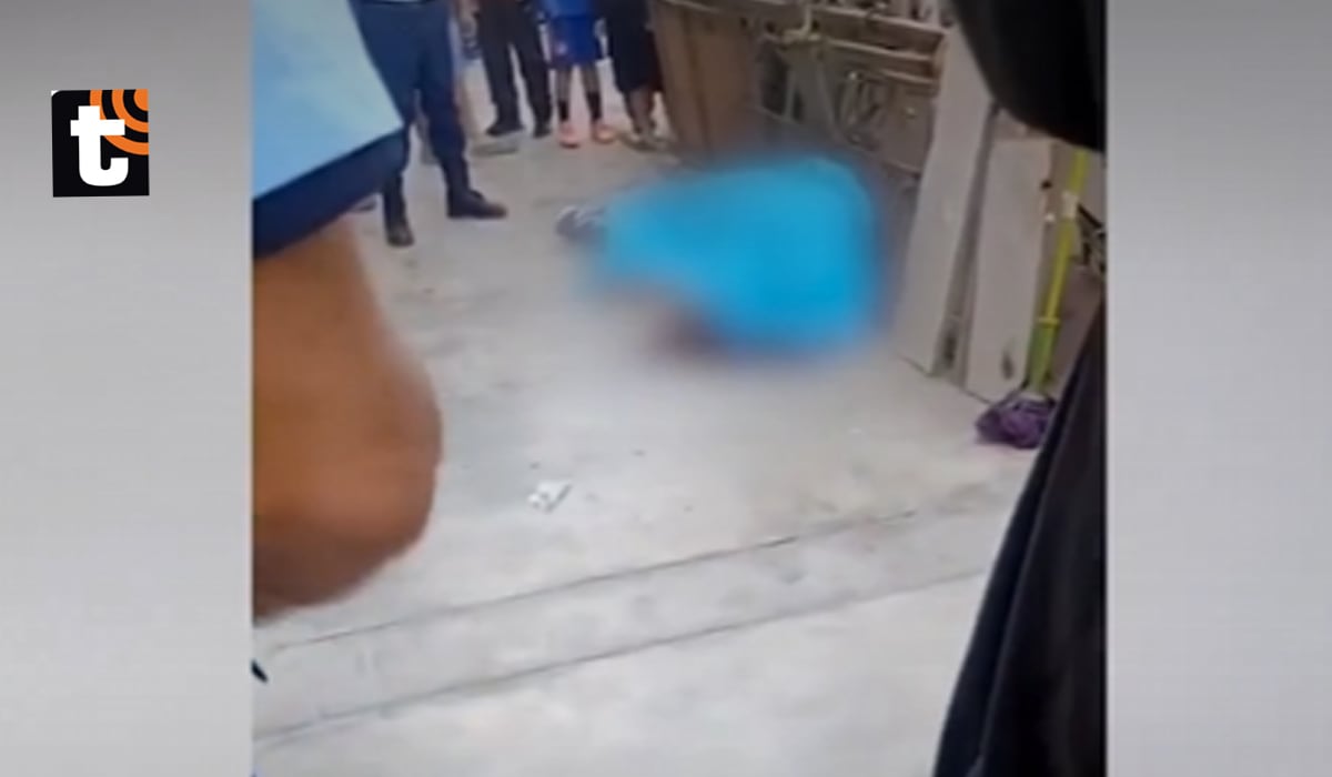 Uno de los cadáveres tras el cobarde ataque de los sicarios.