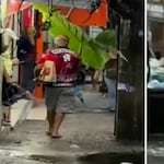 Hombre se vuelve viral en Río de Janeiro al usar una hoja gigante como paraguas