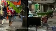 Hombre se vuelve viral en Río de Janeiro al usar una hoja gigante como paraguas