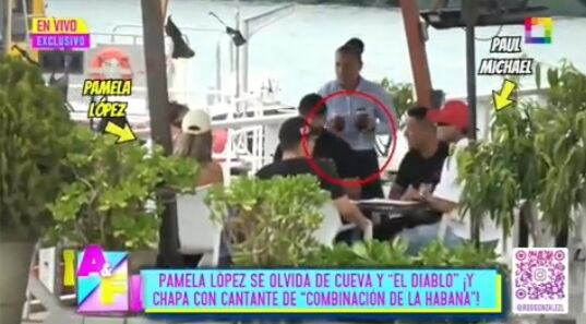 Pamela López y Paul Michael comiendo en grupo.