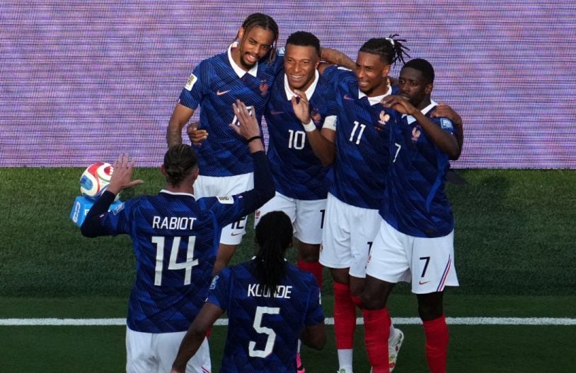 France's forward #10 Kylian Mbappe celebrates scoring his team's third goal with teammates during the 2026 World Cup round of 32 football match between France and Sweden at the New York/New Jersey Stadium in East Rutherford on June 30, 2026. (Photo by TIMOTHY A. CLARY / AFP)