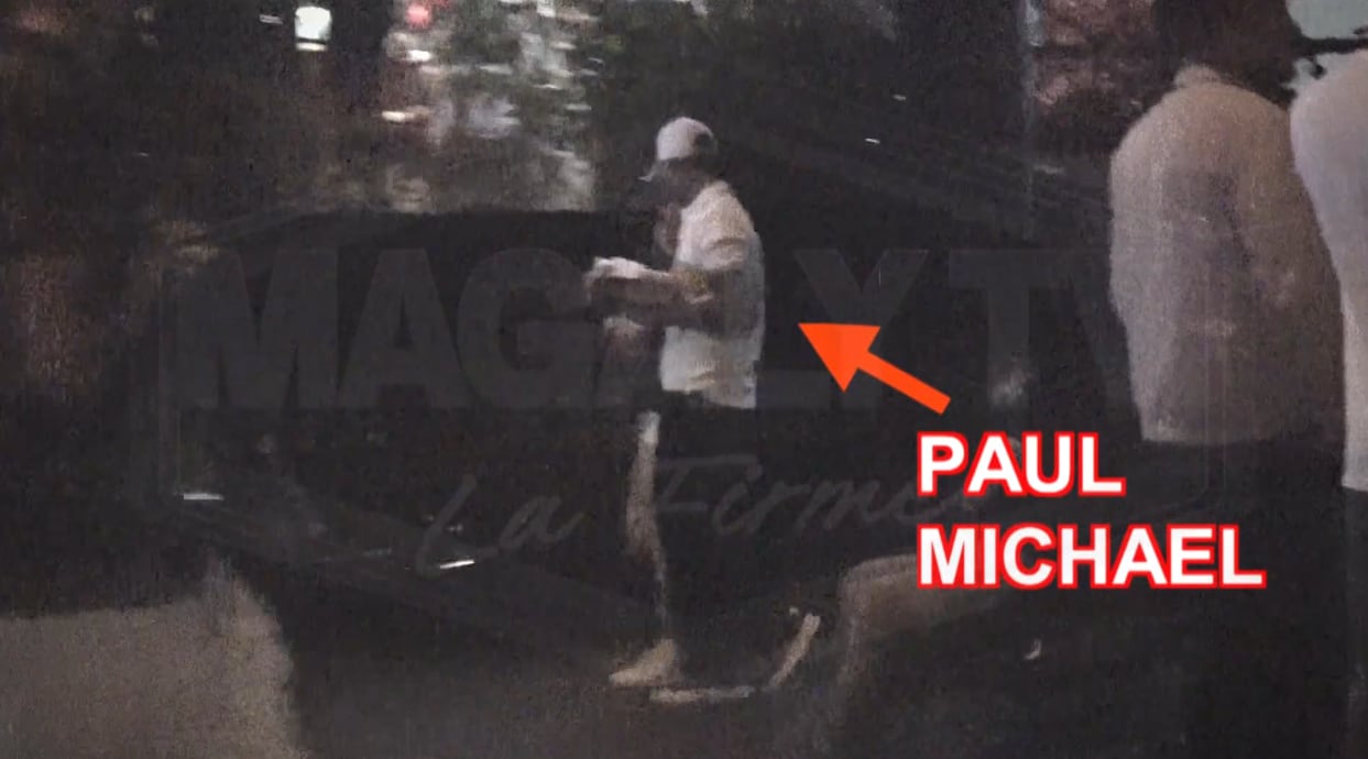 Paul Michael captado con misteriosa mujer.