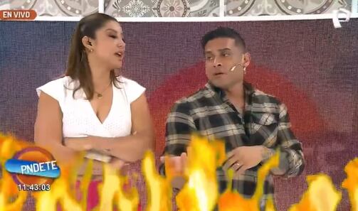 Karla Tarazona y Christian Domínguez se "enfrentan" al momento de presentar una nota.