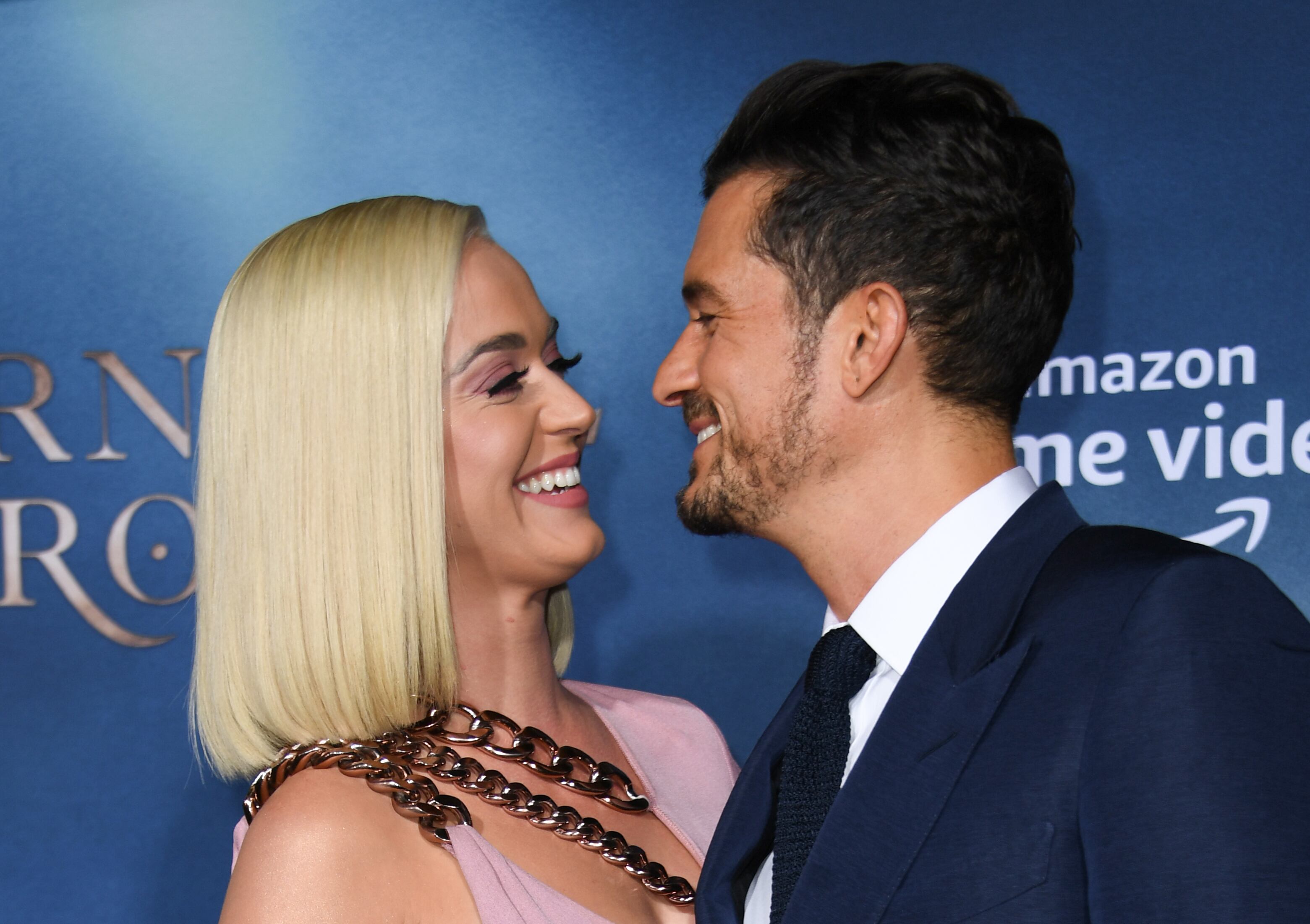 British actor Orlando Bloom and US singer/songwriter Katy Perry arrive for the Los Angeles premiere of Amazon Original Series "Carnival Row" at the TCL Chinese theatre on August 21, 2019 in Hollywood. (Photo by VALERIE MACON / AFP) / ALTERNATIVE CROP