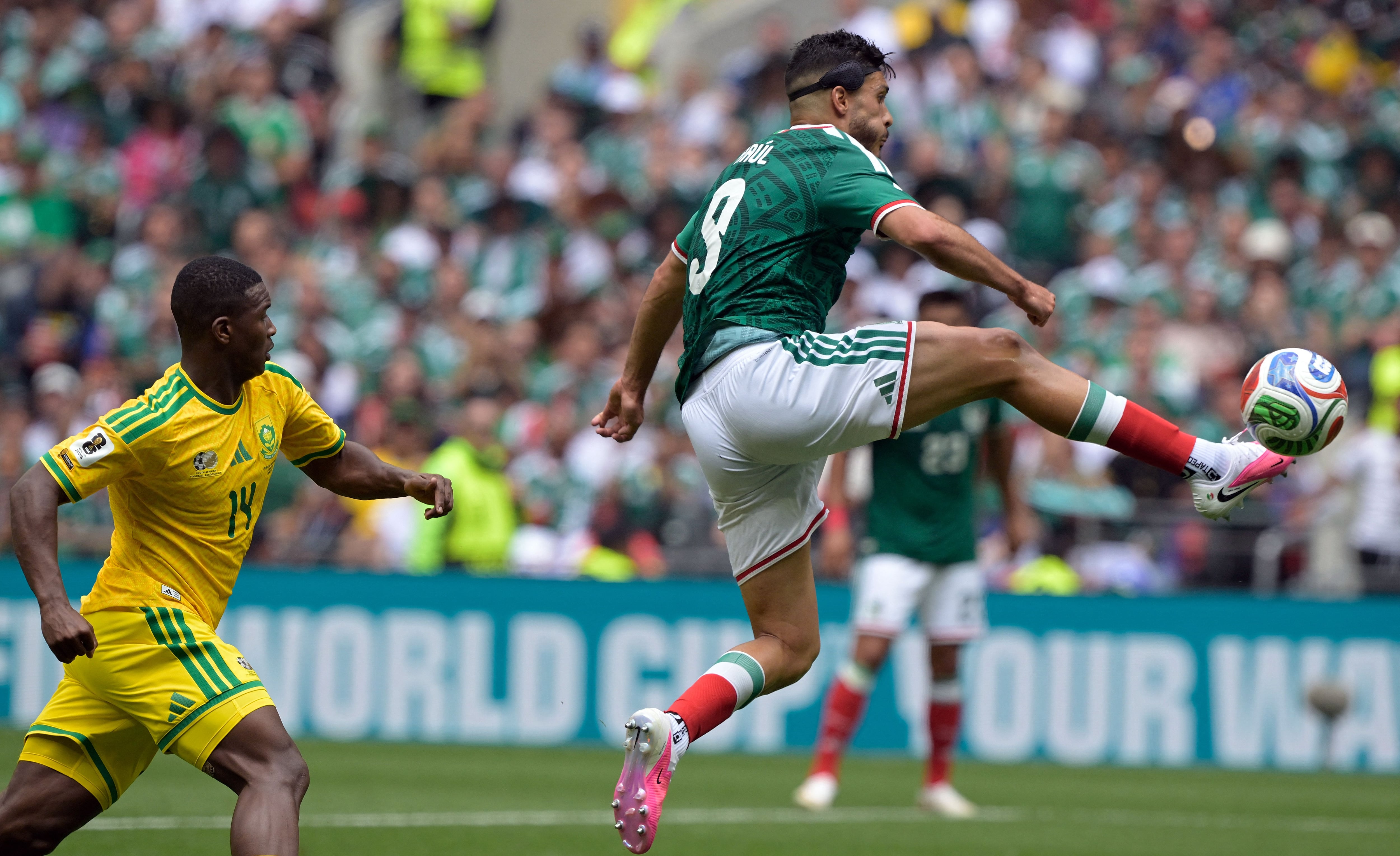 Mexico's forward #09 Raul Jimenez jumps for the ball during the 2026 World Cup Group A football match between Mexico and South Africa at the Mexico City Stadium in Mexico City on June 11, 2026. (Photo by Alfredo ESTRELLA / AFP)