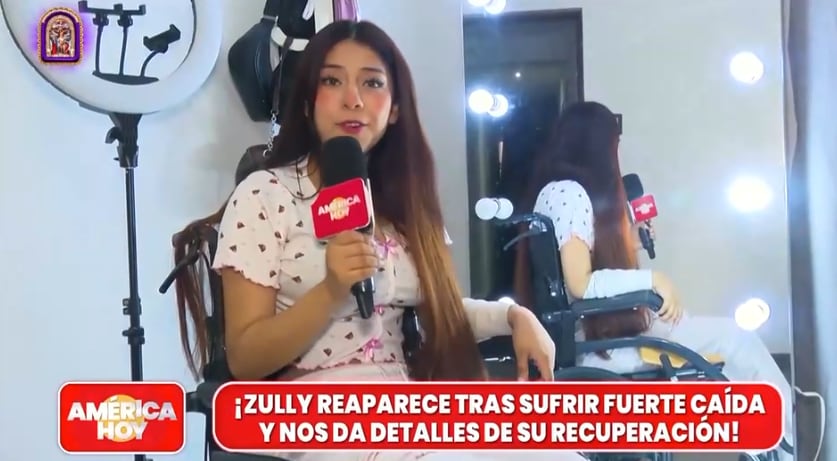 Zully reaparece en silla de ruedas tras aparatosa caída con espejo durante mudanza.