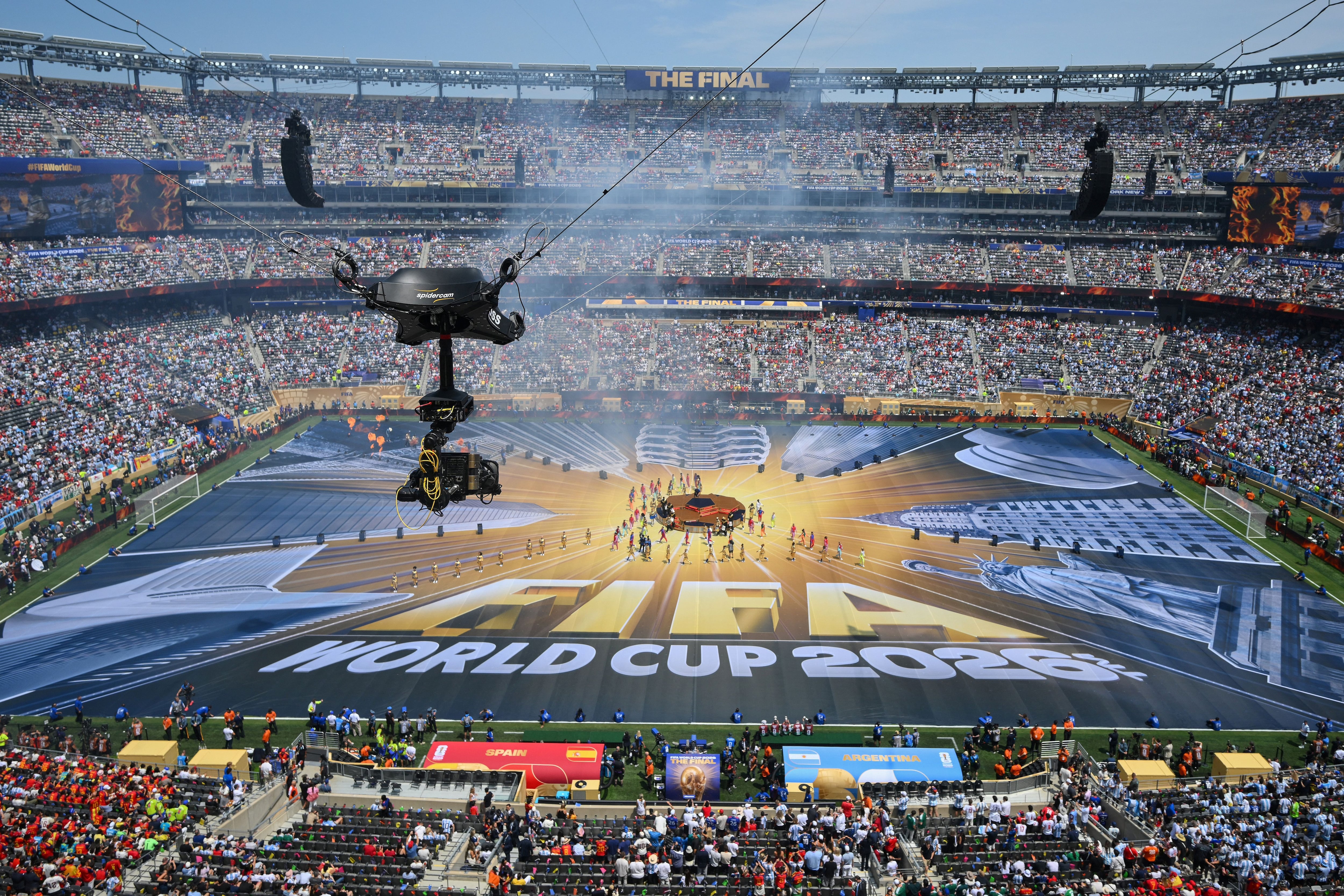 A general view shows spectators watching dancers and musicians performing during the closing ceremony of the 2026 World Cup football tournament final match between Spain and Argentina at the New York/New Jersey Stadium in East Rutherford on July 19, 2026. (Photo by ANGELA WEISS / AFP)