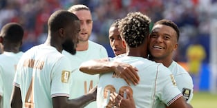 France's forward #10 Kylian Mbappe (R) celebrates scoring his team's first goal with teammate forward #20 Desire Doue during the 2026 World Cup football tournament quarter-final match between France and Morocco at Boston Stadium in Foxborough on July 9, 2026. (Photo by Odd ANDERSEN / AFP)