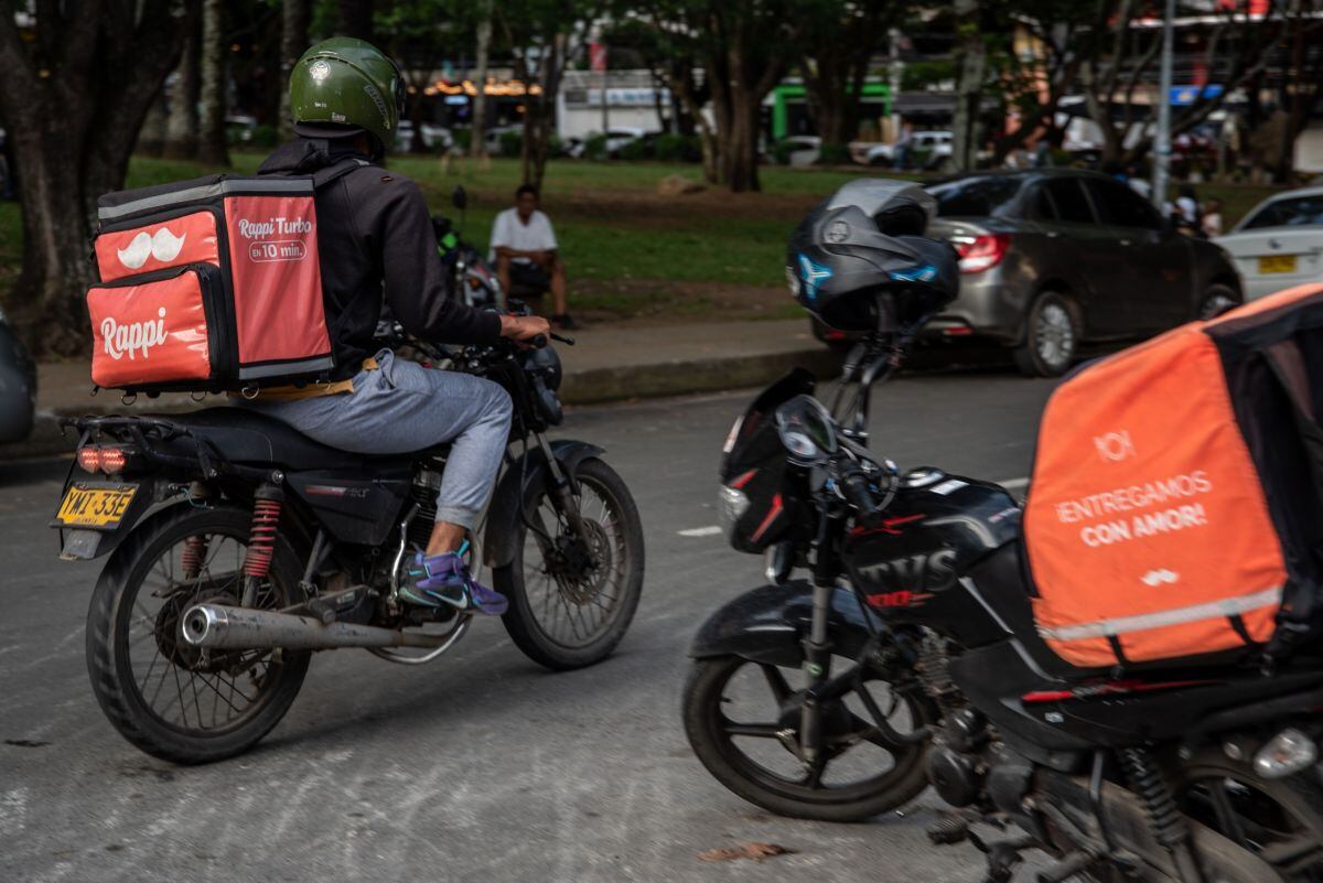 A Rappi food delivery courier in Cali, Colombia, on Saturday, May 27, 2023. The Colombian government's labor reform project aims to ensure that delivery platforms be responsible for the safety of their workers, ensuring they are affiliated to the social security, health, pension and labor risk subsystems and comply with their obligations to pay tax, or directly assume the payment of 100% of the contributions as employers. Photographer: Jair F. Coll/Bloomberg