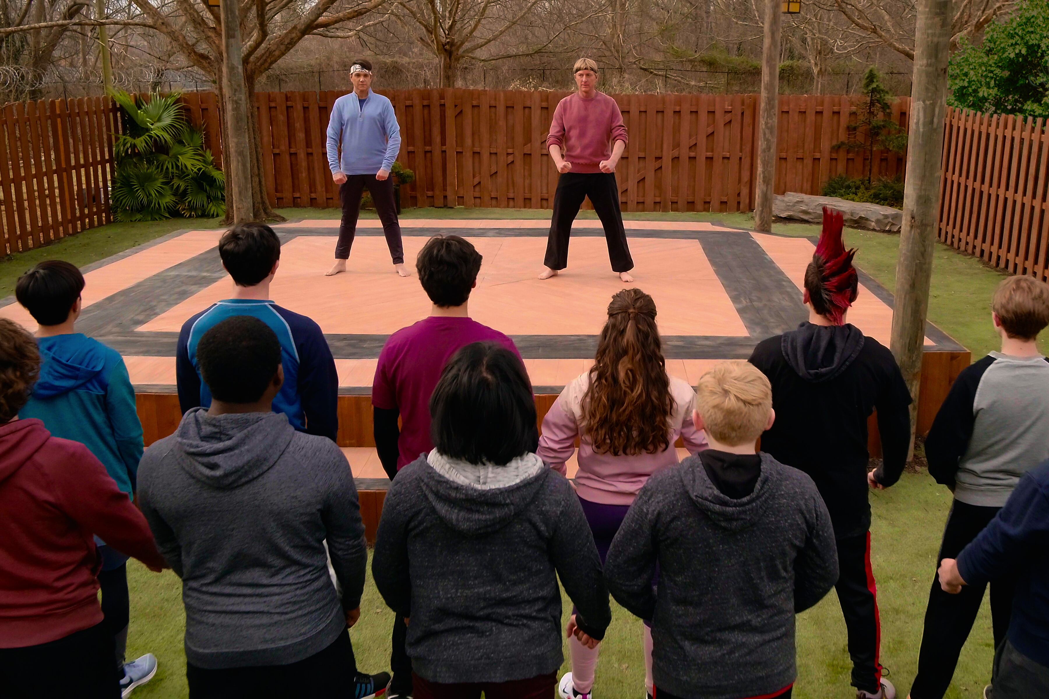 Cobra Kai. (L to R) Ralph Macchio as Daniel LaRusso, William Zabka as Johnny Lawrence in Cobra Kai. Cr. Courtesy of Netflix © 2021