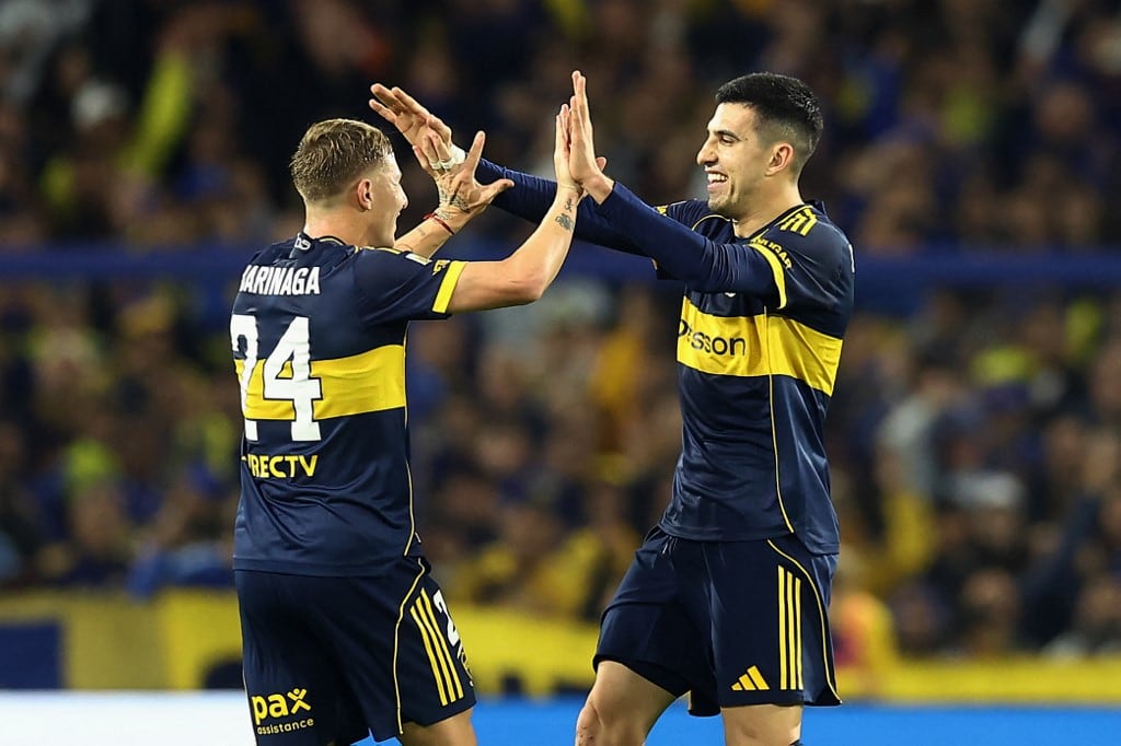 Festejo de Juan Barinaga con Boca Junior . (Photo by ALEJANDRO PAGNI / AFP)