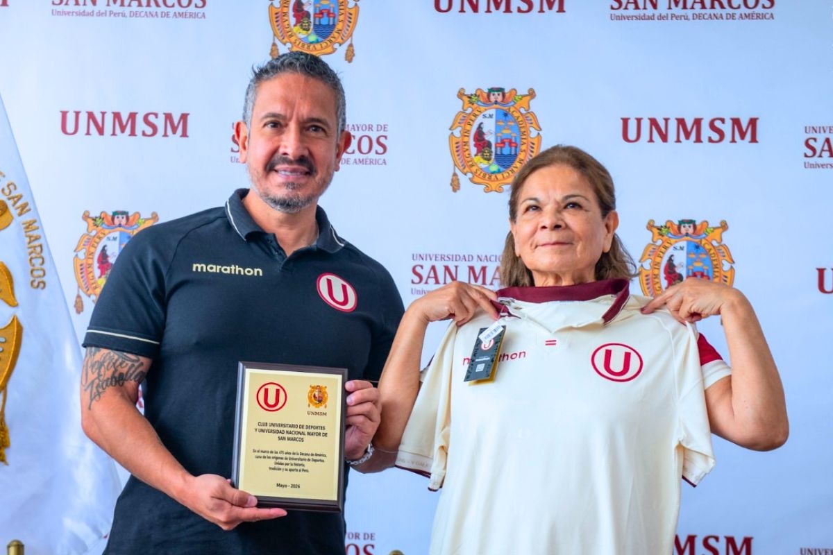 Administrador crema y rectora de San Marcos posan en la firma de convenio (Foto: @UNMSM)