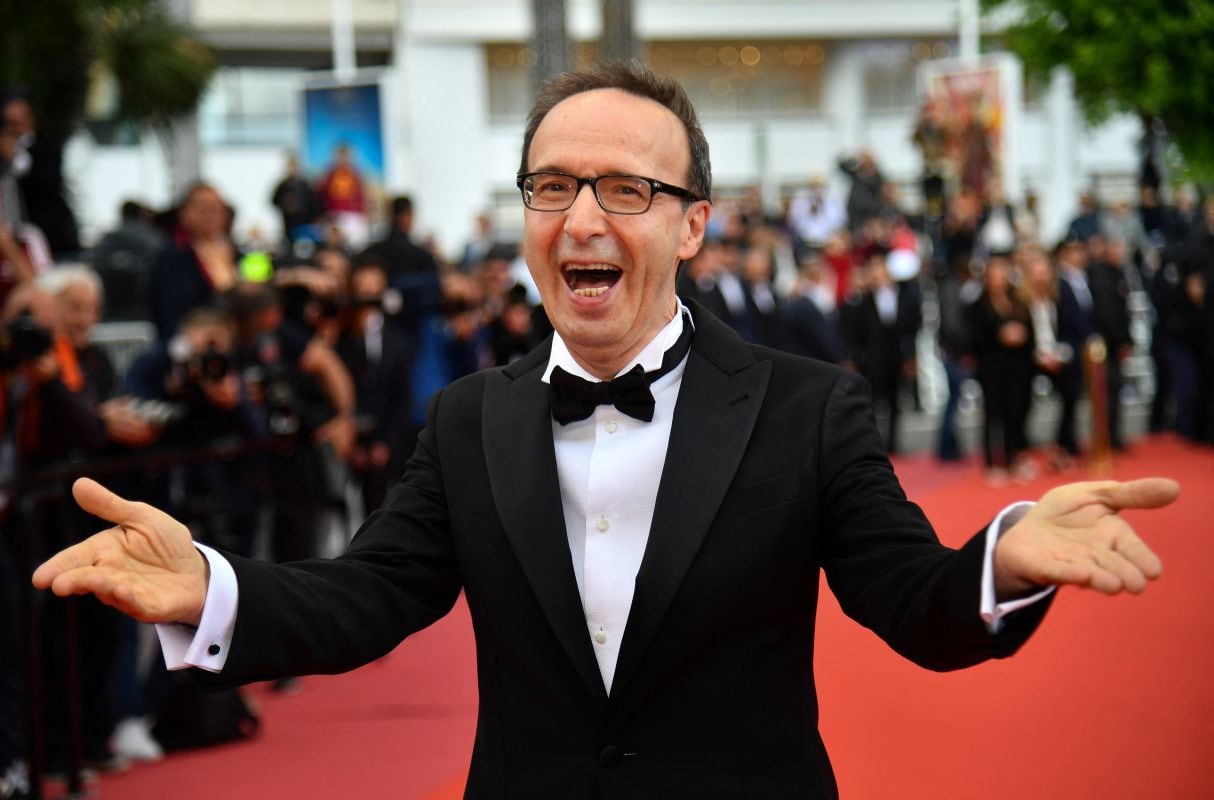 Roberto Benigni, vestido de traje y listo para recibir el León de Oro honorífico de la Mostra de Venecia. (Foto: Alberto PIZZOLI / AFP)