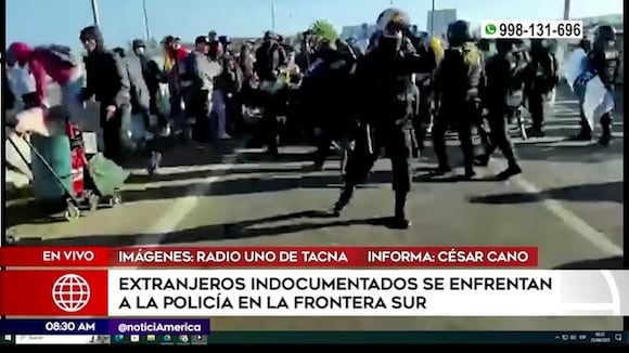Extranjeros se enfrentan a policías en frontera con Chile