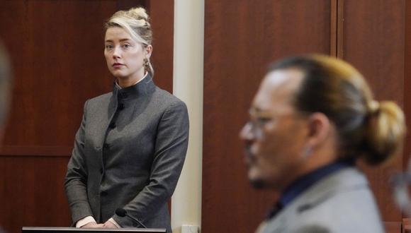 Amber Heard debe pagarle más de 10 millones de dólares a Johnny Depp tras perder juicio. (Foto: Steve Helber / AFP)